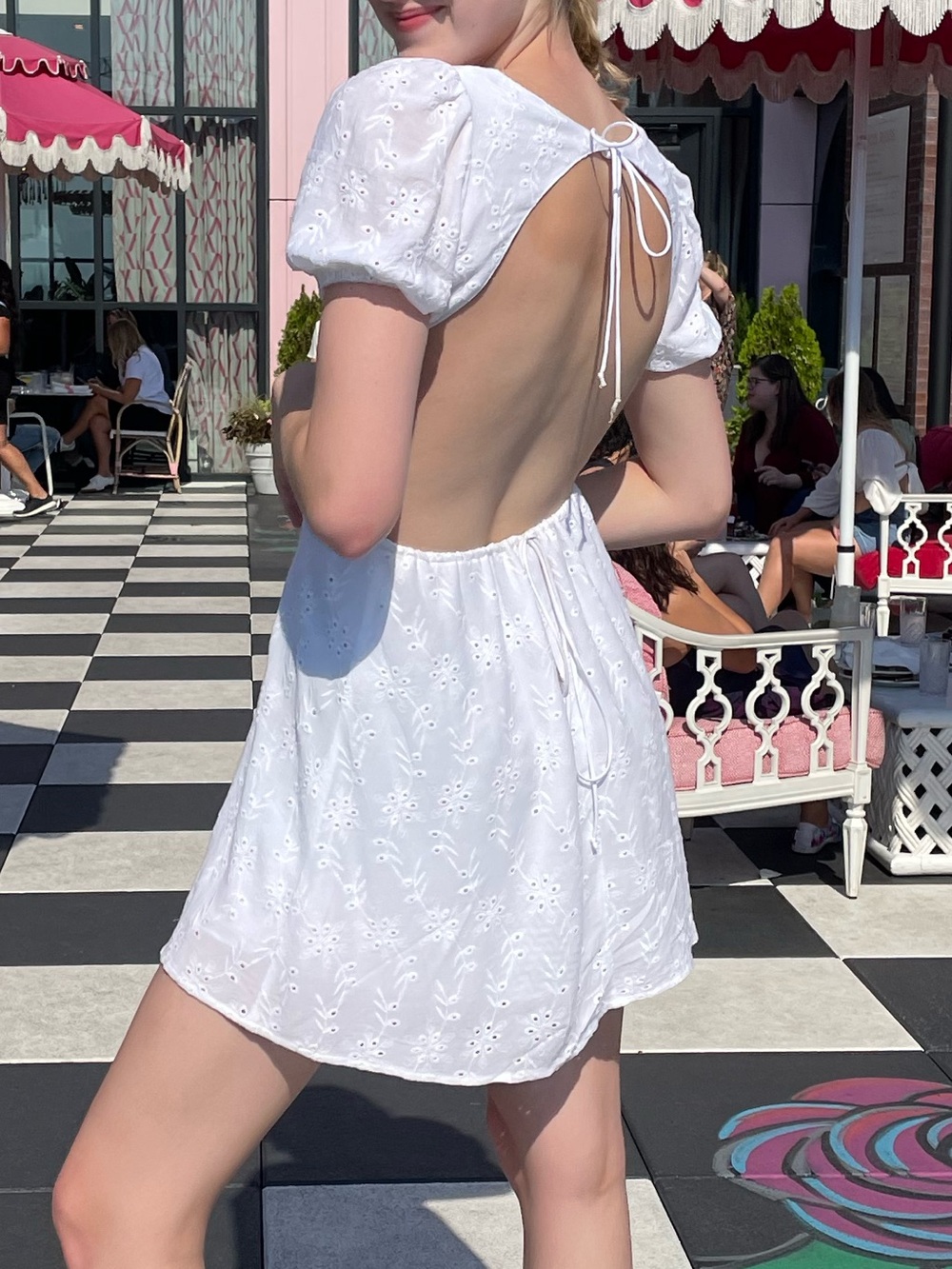 Backless white mini dress